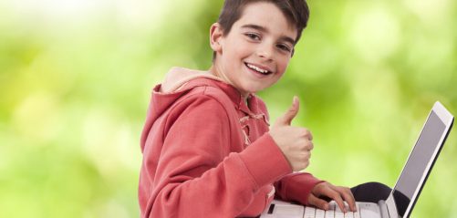 child with laptop computer
