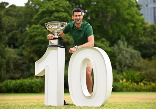 Djokovic poses with trophy after Australian Open win